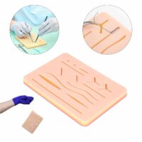 doctor holding regular suture practice pad with forceps performing stitches