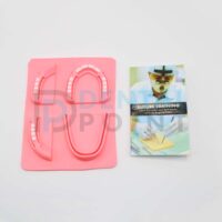 dental suture pad with suture training guide
